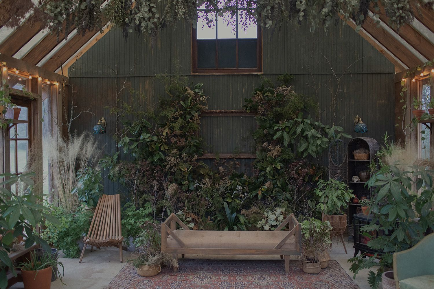 Image of 2 retro cars in a driveway of a Palm Springs house